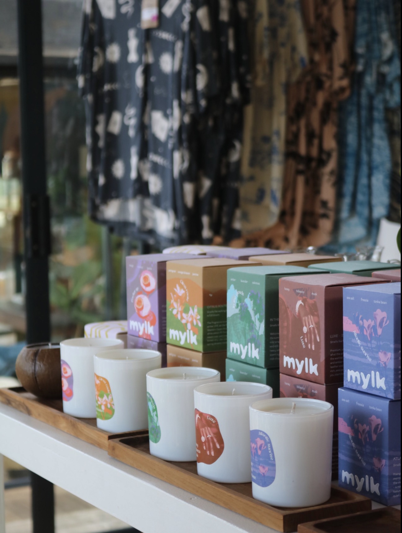 Row of soy candles in the boutique
